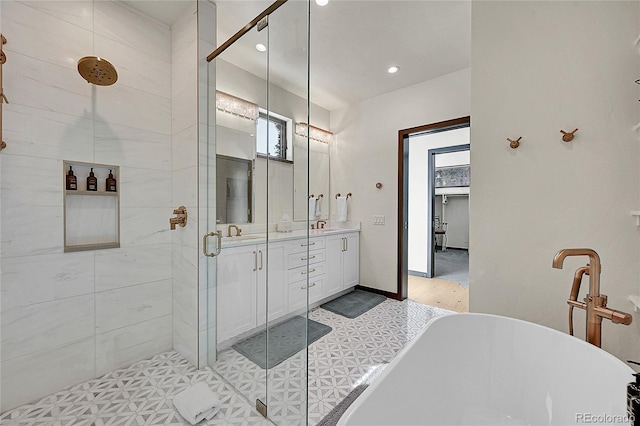 55 Blue Flag Dr, Breckenridge, CO 80424 - bathroom with a stall shower, healthy amount of natural light, double vanity, a soaking tub, and recessed lighting