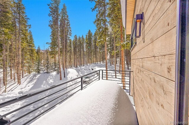 55 Blue Flag Dr, Breckenridge, CO 80424 - snow covered deck with a view of trees