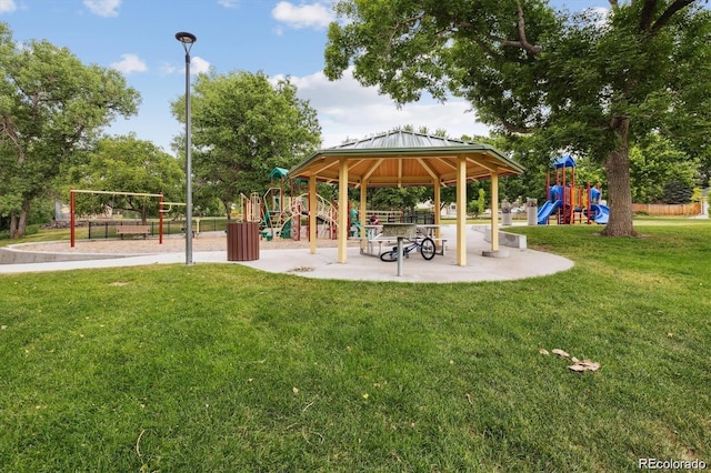 surrounding community with a gazebo, a lawn, and a playground