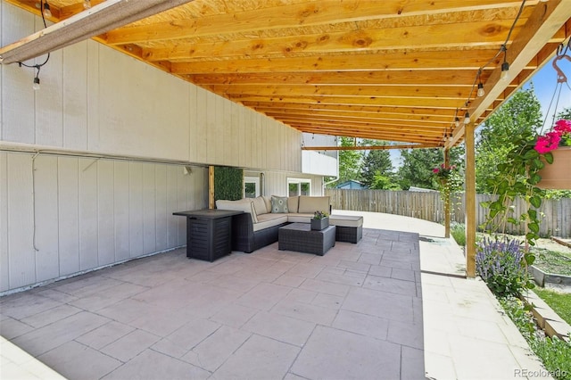 view of patio with outdoor lounge area and a fenced backyard