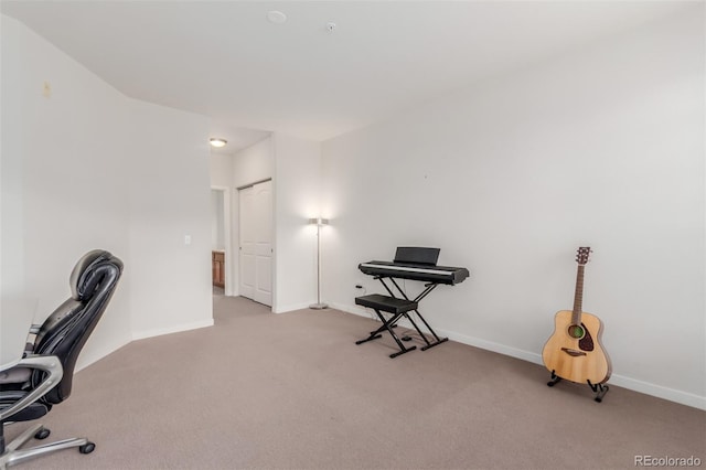unfurnished office with carpet and baseboards