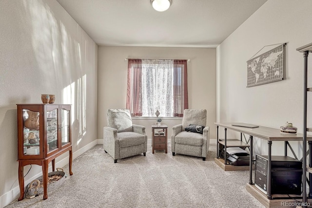 sitting room with light colored carpet