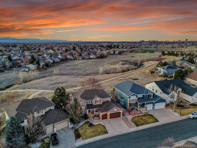 aerial view at dusk with a residential view