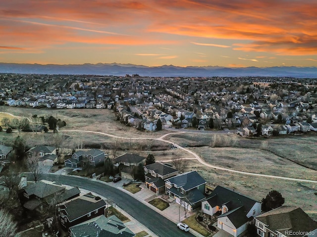 bird's eye view featuring a mountain view and a residential view