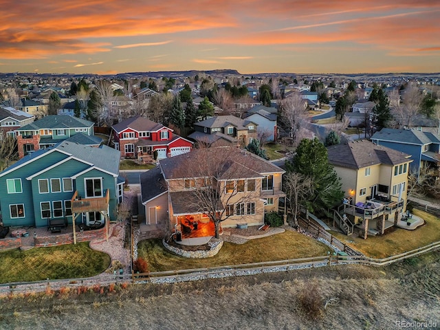 aerial view at dusk with a residential view