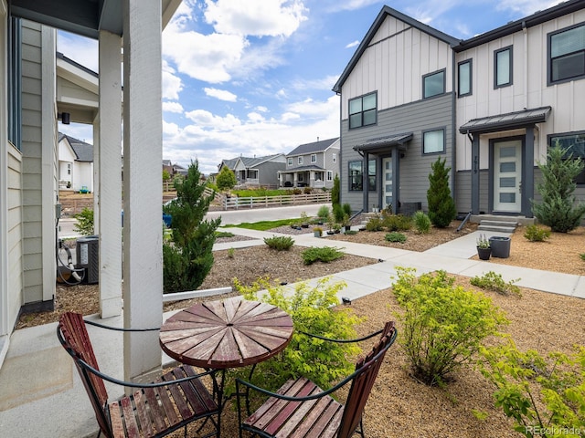 view of patio with central AC unit