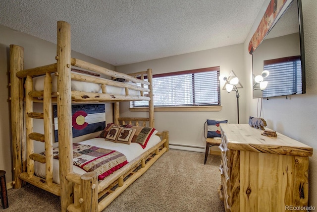 405 Four Oclock Rd Unit 15-A, Breckenridge, CO 80424 - bedroom featuring baseboard heating, carpet, and a textured ceiling