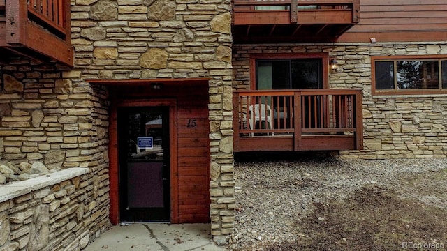 405 Four Oclock Rd Unit 15-A, Breckenridge, CO 80424 - property entrance featuring stone siding and a balcony