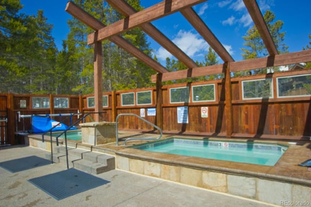 405 Four Oclock Rd Unit 15-A, Breckenridge, CO 80424 - view of pool featuring a swimming pool and an in-ground hot tub