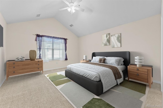 bedroom with lofted ceiling, light carpet, and ceiling fan