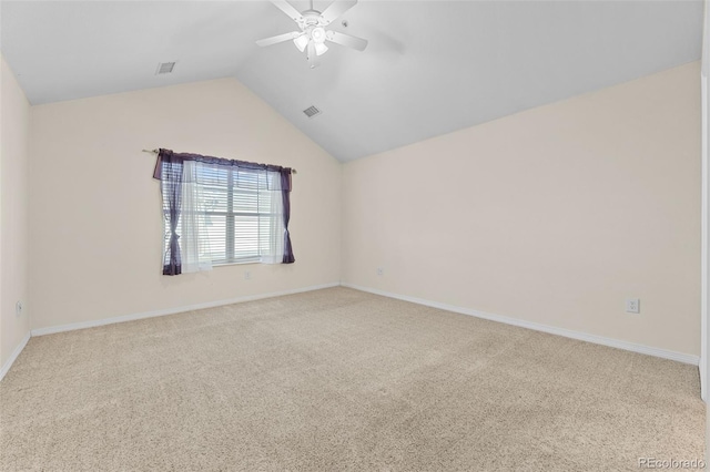 unfurnished room featuring light carpet, lofted ceiling, and ceiling fan