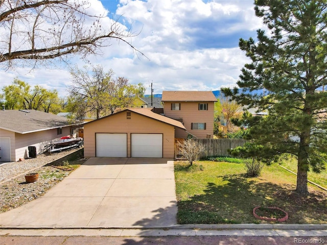 view of front of home featuring a garage and an outdoor structure