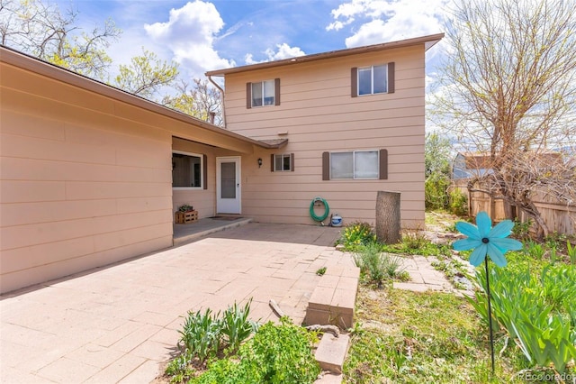 rear view of property with a patio