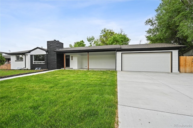 290 Beryl Way, Broomfield, CO 80020 - view of front of home with an attached garage, a chimney, and driveway