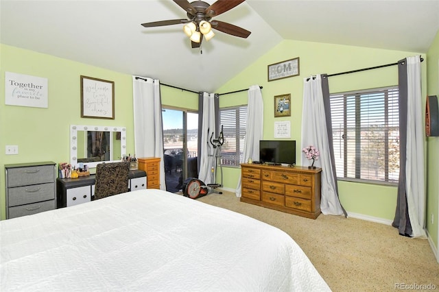 bedroom with a ceiling fan, multiple windows, vaulted ceiling, and baseboards