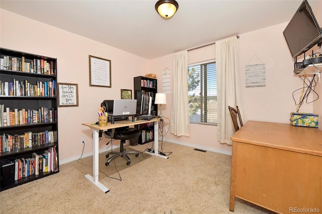 home office featuring baseboards and visible vents