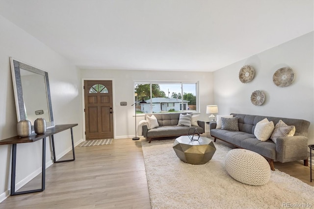 3384 W Arlington Ave, Littleton, CO 80123 - living area with light wood-type flooring and baseboards