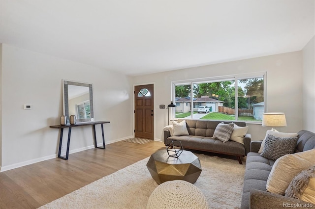 3384 W Arlington Ave, Littleton, CO 80123 - living room featuring wood finished floors and baseboards