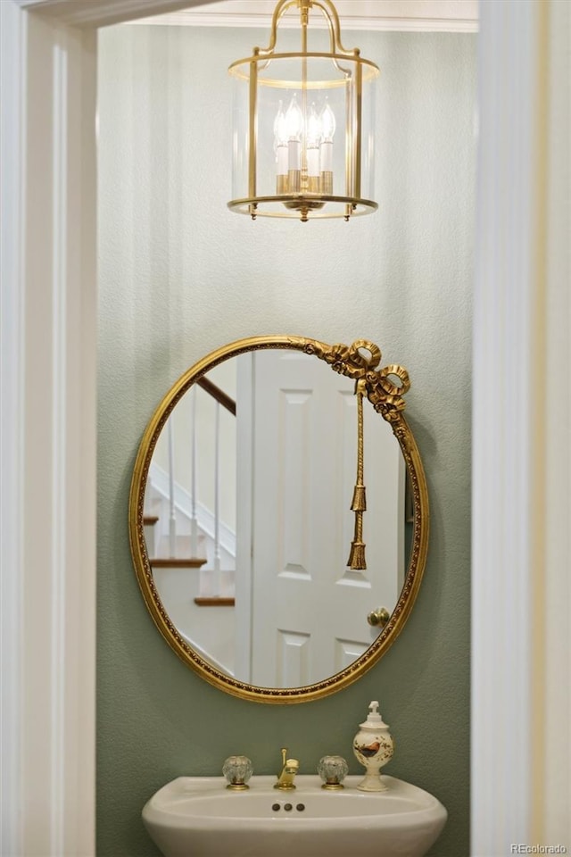 room details with sink and an inviting chandelier