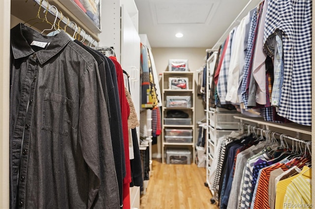 spacious closet featuring hardwood / wood-style floors