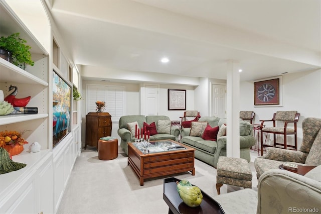 living room featuring light carpet