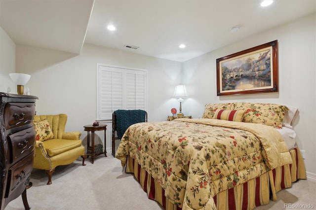 bedroom with light carpet