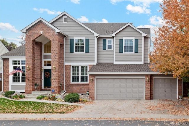 front of property with a garage