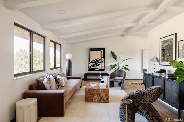 living room with vaulted ceiling with beams