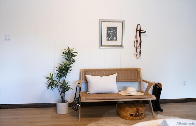 sitting room featuring hardwood / wood-style floors