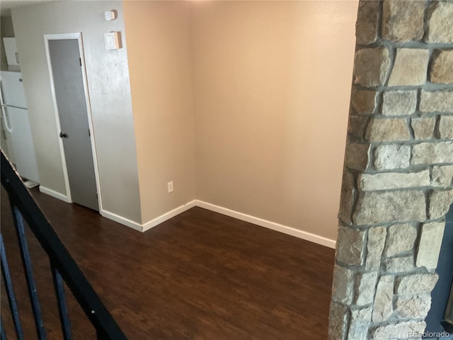 interior space with dark hardwood / wood-style floors