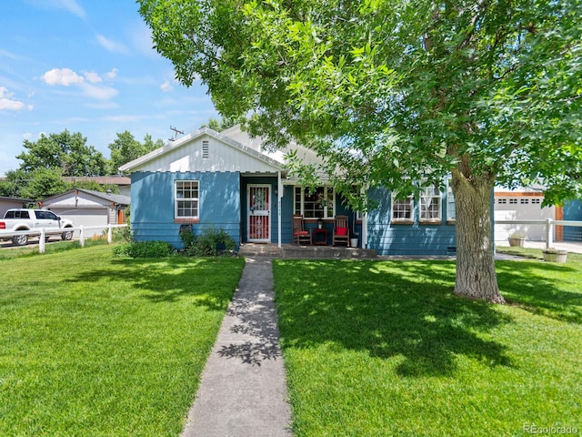 4540 Yarrow St, Wheat Ridge, CO 80033 - view of front of home with a porch