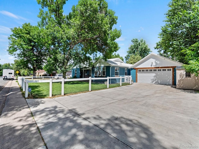 4540 Yarrow St, Wheat Ridge, CO 80033 - ranch-style home with a garage