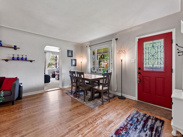 4540 Yarrow St, Wheat Ridge, CO 80033 - dining area with wood finished floors and arched walkways