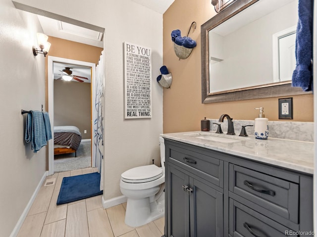 4540 Yarrow St, Wheat Ridge, CO 80033 - ensuite bathroom featuring vanity, tile patterned flooring, and ceiling fan