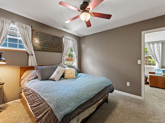 4540 Yarrow St, Wheat Ridge, CO 80033 - carpeted bedroom featuring baseboards and a ceiling fan