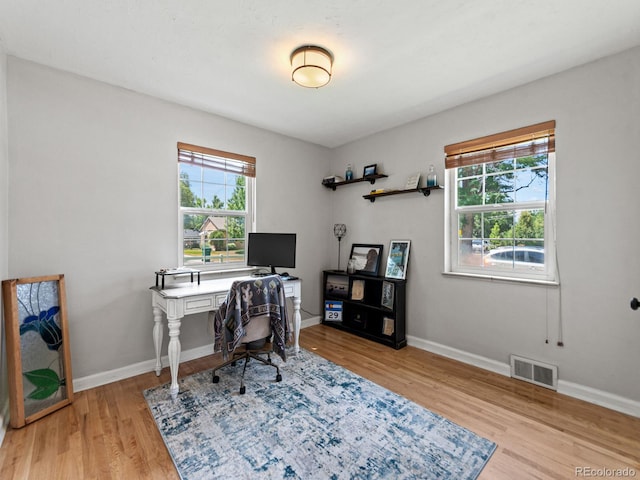 4540 Yarrow St, Wheat Ridge, CO 80033 - home office with light wood-type flooring and baseboards