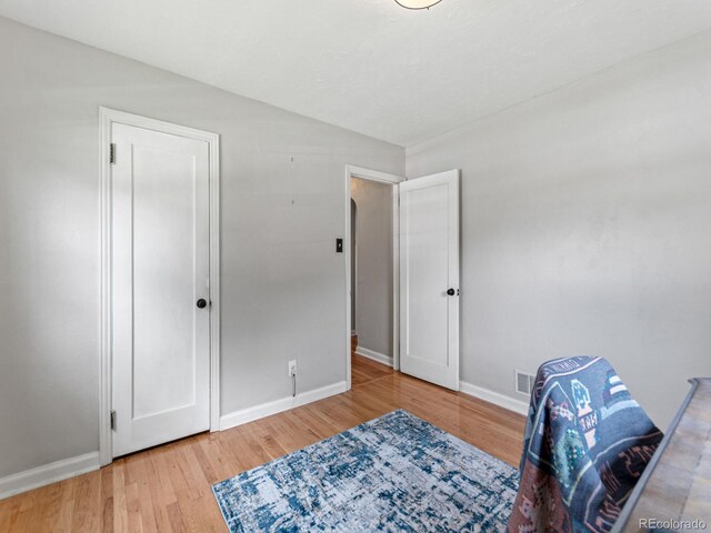4540 Yarrow St, Wheat Ridge, CO 80033 - living area featuring light wood-type flooring and baseboards