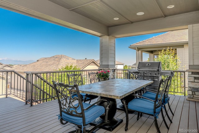 16383 Ute Peak Way, Broomfield, CO 80023 - wooden terrace with outdoor dining area
