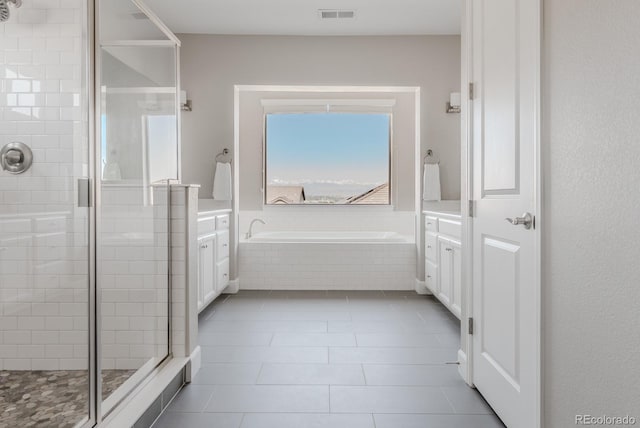 16383 Ute Peak Way, Broomfield, CO 80023 - full bath with vanity, a shower stall, a bath, and tile patterned floors