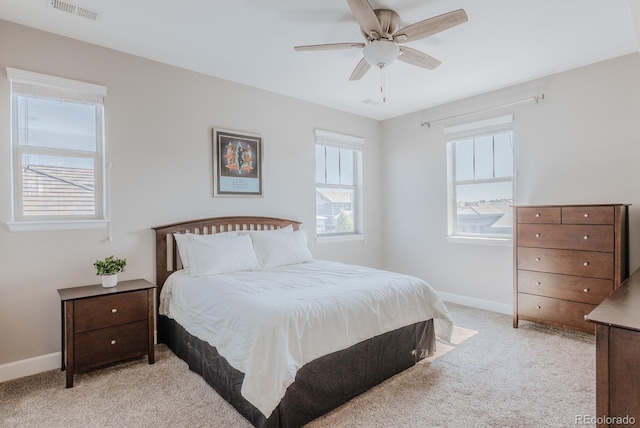 16383 Ute Peak Way, Broomfield, CO 80023 - bedroom featuring light colored carpet and a ceiling fan