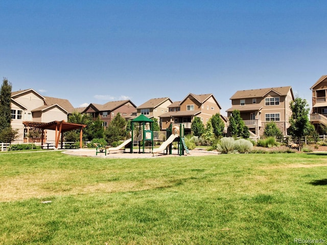 16383 Ute Peak Way, Broomfield, CO 80023 - community jungle gym featuring a residential view and a lawn