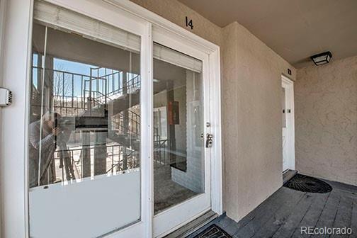 214 N Main St Unit 14, Breckenridge, CO 80424 - doorway to property with stucco siding