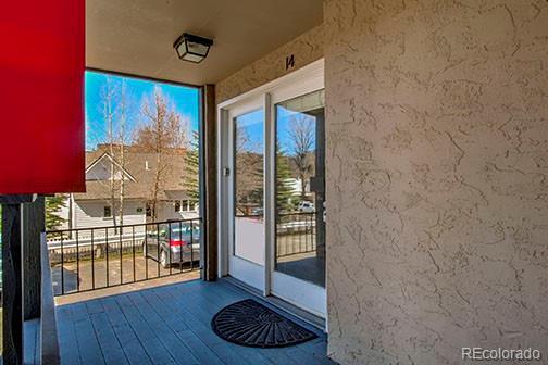 214 N Main St Unit 14, Breckenridge, CO 80424 - doorway to property featuring a balcony and stucco siding