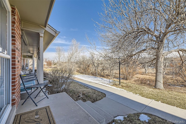 view of patio featuring a porch