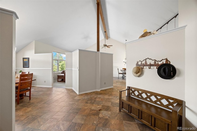 corridor featuring stone finish floors and baseboards