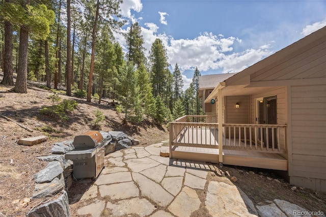 view of patio featuring a wooden deck