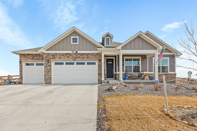 craftsman-style house featuring covered porch and a garage