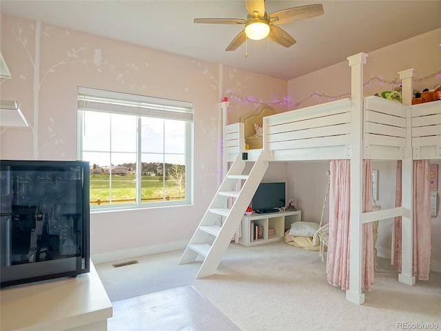 unfurnished bedroom with carpet floors, baseboards, and visible vents