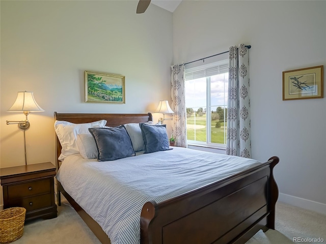 bedroom with carpet floors, baseboards, a ceiling fan, and high vaulted ceiling