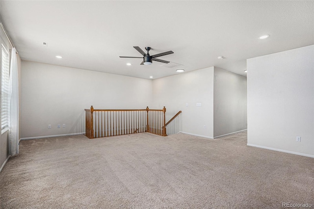 12710 Jasmine St Unit C, Thornton, CO 80602 - spare room featuring baseboards, ceiling fan, carpet, and recessed lighting